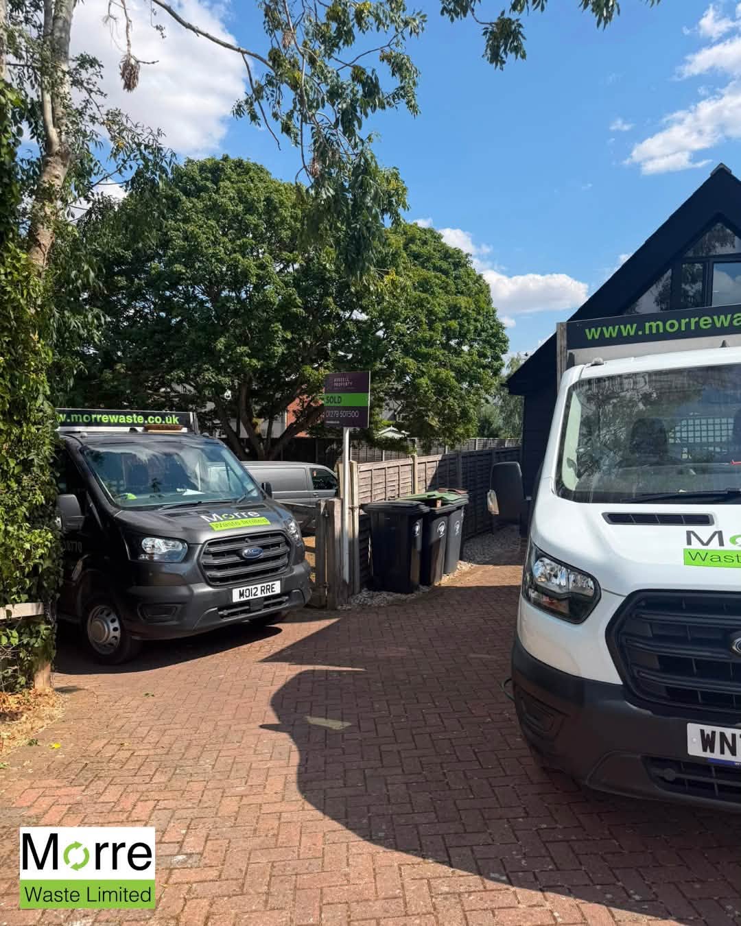 Morre Waste vans parked on a residential driveway for a clearance job
